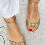 Isadora – Gyllene flätade sandaler