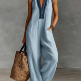 Fiamma | Sleeveless jumpsuit with high collar